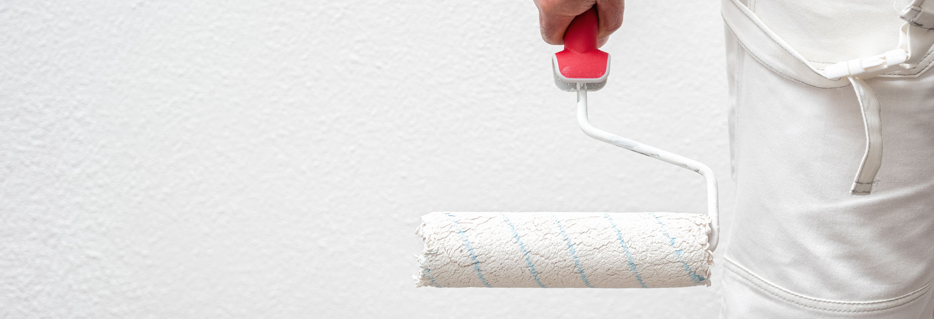 Holding Paint Roller